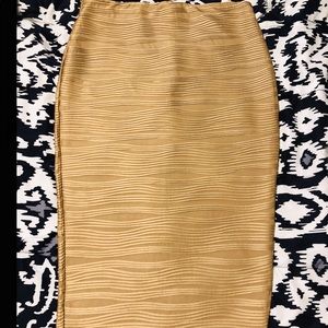 Formal gold over the knee skirt